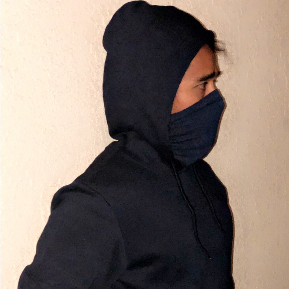 Hoodie with attached face covering